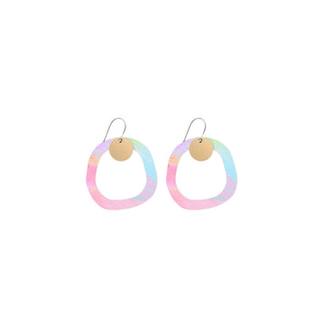A pair of circle shaped drop earrings with an outline printed with artwork by Maggi McDonald.