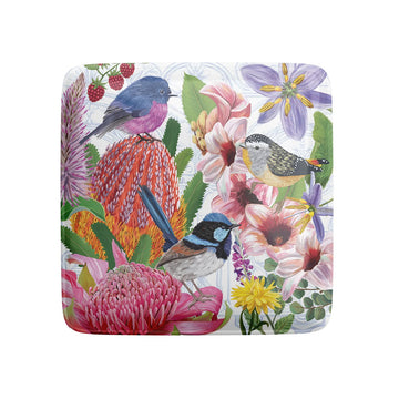 A square magnet illustrated with birds and flowers.