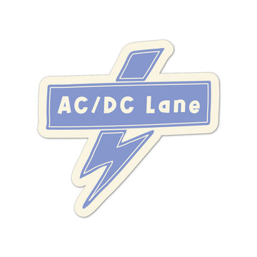 Magnet with 'AC/DC Lane' text and a lightning bolt design on a white background.
