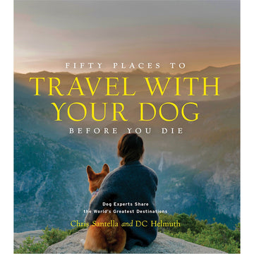 'Fifty Places to Travel With Your Dog' book cover featuring a photo of the backs of a person and their dog sitting on a rock looking at mountains.
