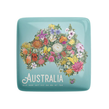 A square magnet illustrated with a map of Australia covered in flowers.