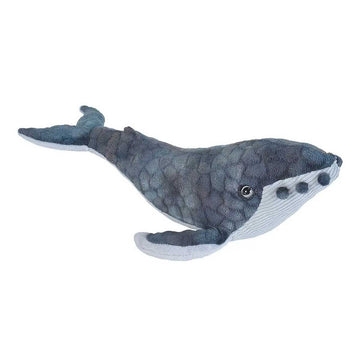 Plush whale toy on a white background.