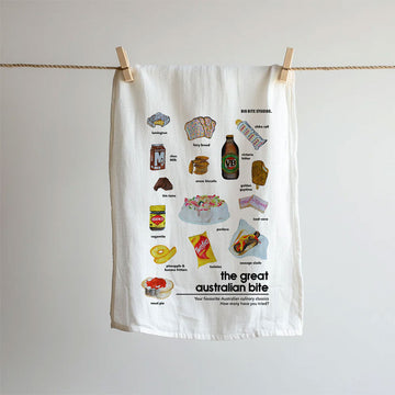 Tea towel with illustrations of Australian food and drinks hanging on a line.