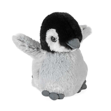 Plush penguin toy on a white background