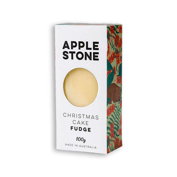 Box of Christmas Cake Fudge with a floral and wombat design on the side.