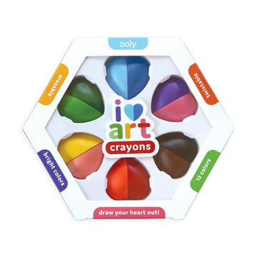 A hexagon shaped box with heart shaped crayons inside split into two different colours. There are words on the hexagon sides 'ooly', 'twistable', '12 colors', 'draw your heart out', 'bright colors' and 'erasable'.