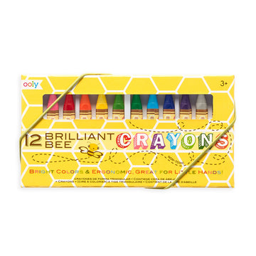 A yellow box printed with honeycombs and a bee and the title '12 Brilliant Bee Crayons'. There is a rectangle cut out showing the coloured crayons inside.