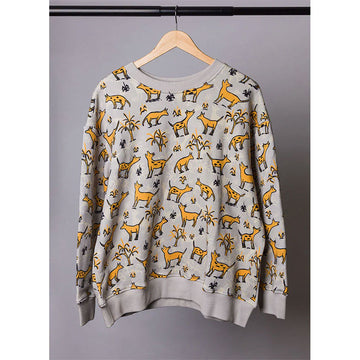 Gray sweater with yellow dingo pattern on a hanger against a gray background.