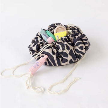 Fabric drawstring bag with a pattern on a white background.