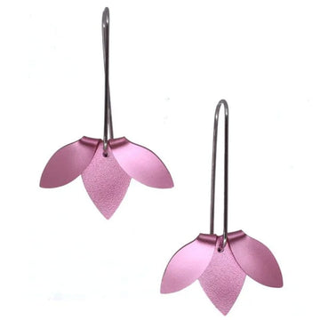 A pair of stainless steel drop earrings in pink with a design resembling part of a flower.