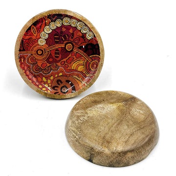 Two round wooden trinket dishes pictured, one showing the inside printed with artwork by Damien and Yilpi Marks and the other showing the wooden back.