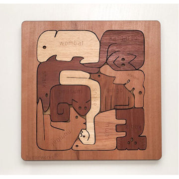 A wooden puzzle featuring Australian animals shapes in a square block.