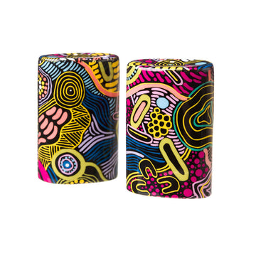 A pair of ceramic salt and pepper shakers printed with colourful artwork by Justin Butler.