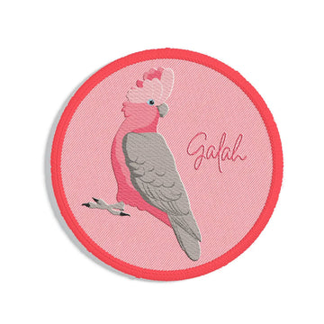A round embroidered patch with a galah and the text 'galah'.