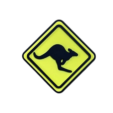 PVC shoe charm with a warning sign with a kangaroo symbol on a white background.