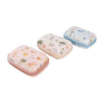 Three small, colourful cases with beach-themed designs on a white background.