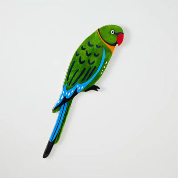 Wall art shaped like a green parrot.