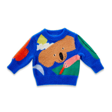 Colorful sweater with koala and bird design on a white background.