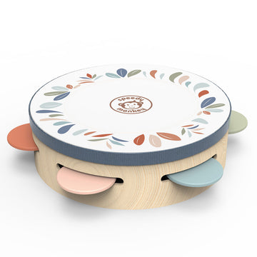 A wooden tambourine laying flat with a colourful border.