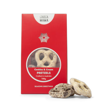 A red packaging box titled 'Cookies and Cream Pretzels' with a window showing the pretzels inside.