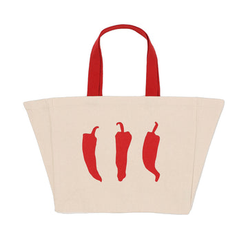 A beige tote bag with red handles and an illustration of three red chilli peppers.