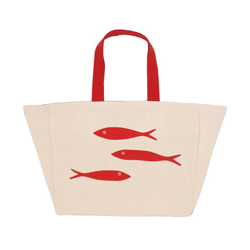 A beige tote bag with red handles and an illustration of three red fish.