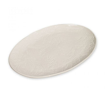 Oval shaped ceramic platter in white with subtle floral engravings.