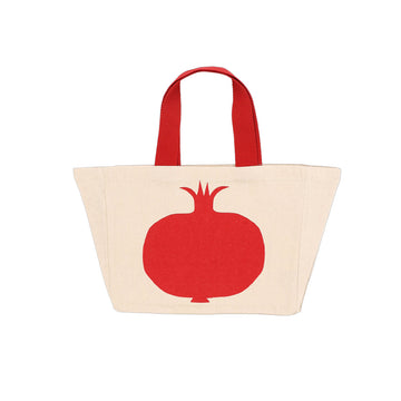 A beige tote bag with red handles and a red illustration of a pomegranate. 