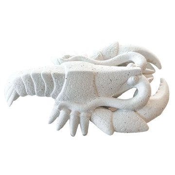 A ceramic sculpture of a lobster.