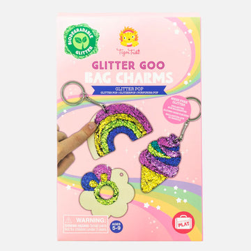 A box titled 'Glitter Goo Bag Charms' with three keyrings pictured in a rainbow, icecream and flower shape covered with glitter.