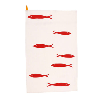 A beige tea towel printed with red fish.