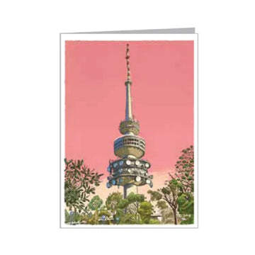 Greeting card with a tower design on a pink background.