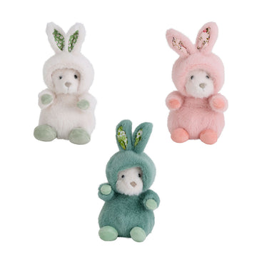Three soft toys shaped like bears wearing bunny onesies in different colours.