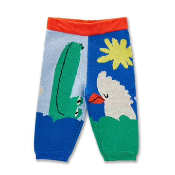 Colorful knitted baby leggings with a crocodile and bird design on a white background.