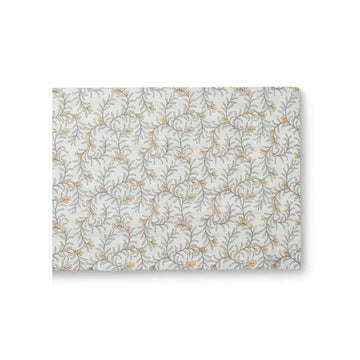 Floral patterned table runner on a white background.