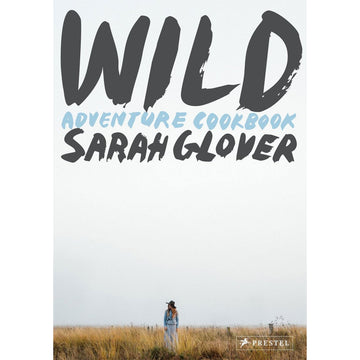 'Wild Adventure Cookbook' book cover featuring a photo of a person standing in a field.