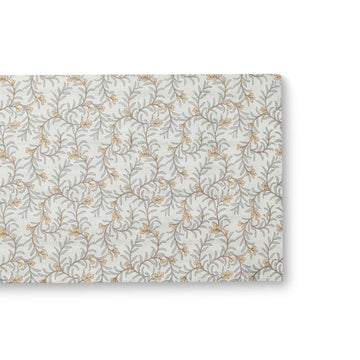 Floral patterned table runner on a white background.