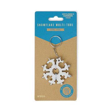 A snowflake shaped tool with different screwdrivers on each end attached to a brown card with the heading 'Snowflake Multi-Tool'.