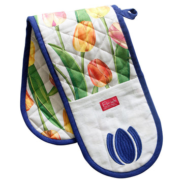 A double oven mitt folded in half with a tulip print and blue bias binding.