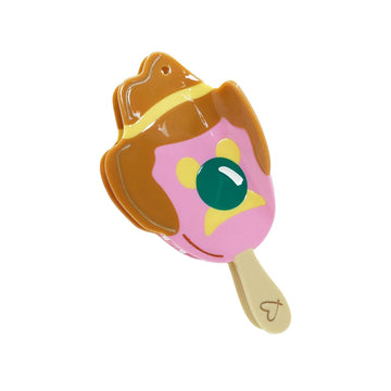 A hair clip shaped like a Bubble O Bill icecream. 