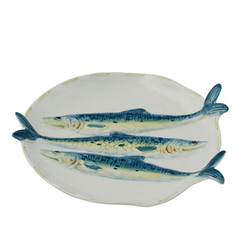 A ceramic plate with three embossed fish on the plate.