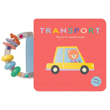 'Transport My first rattle book' book cover featuring an illustration of a teddy bear driving a car. The book has a handle on the side like a rattle.