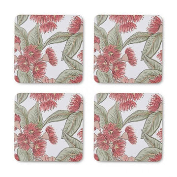 Four floral coasters with red flowers and green leaves on a white background.