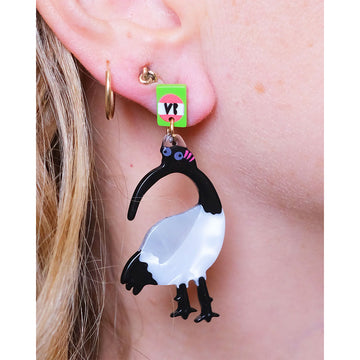 Pair of ibis-shaped earrings with colorful tags on a white background.