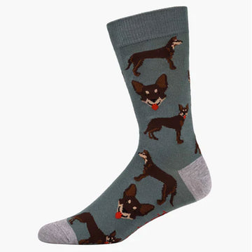 A khaki green sock with a light grey heel and toe and printed with kelpie dogs.
