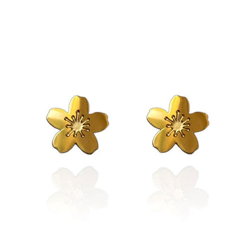 A pair of gold cherry blossom shaped stud earrings.