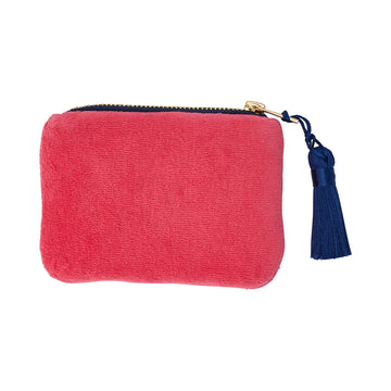 A ink velvet coin purse with a navy zip and tassel.