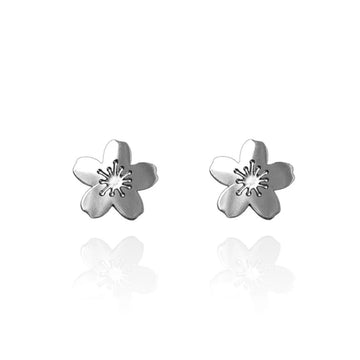 A pair of silver cherry blossom shaped stud earrings.