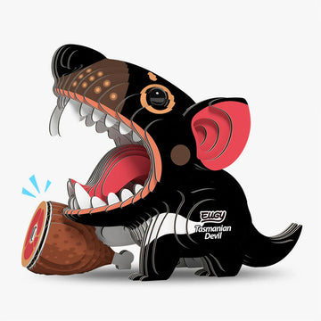 Toy model of a Tasmanian Devil with an open mouth on a white background.