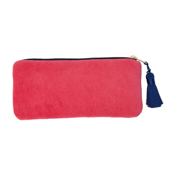 A pink rectangle shaped makeup bag with a navy blue zip and tassel.